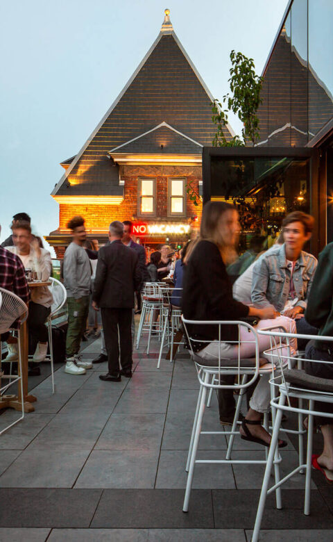 busy rooftop patio at dusk