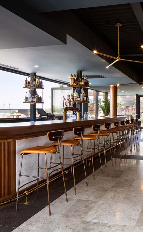 empty upscale bar with tall chairs