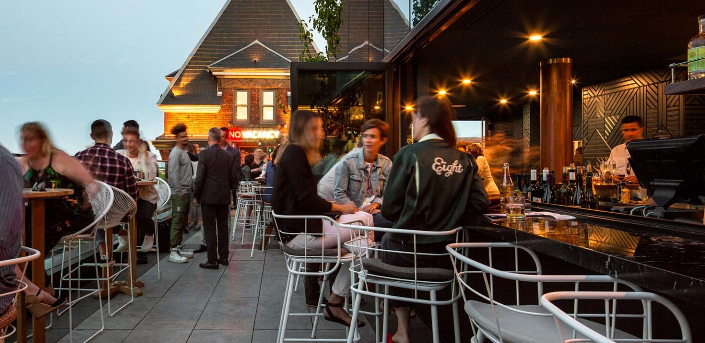 busy rooftop patio at dusk